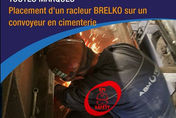 Technicien meulant en tenue de protection pour poser un racleur Brelko en cimenterie (Service Racleurs ABM TECNA)